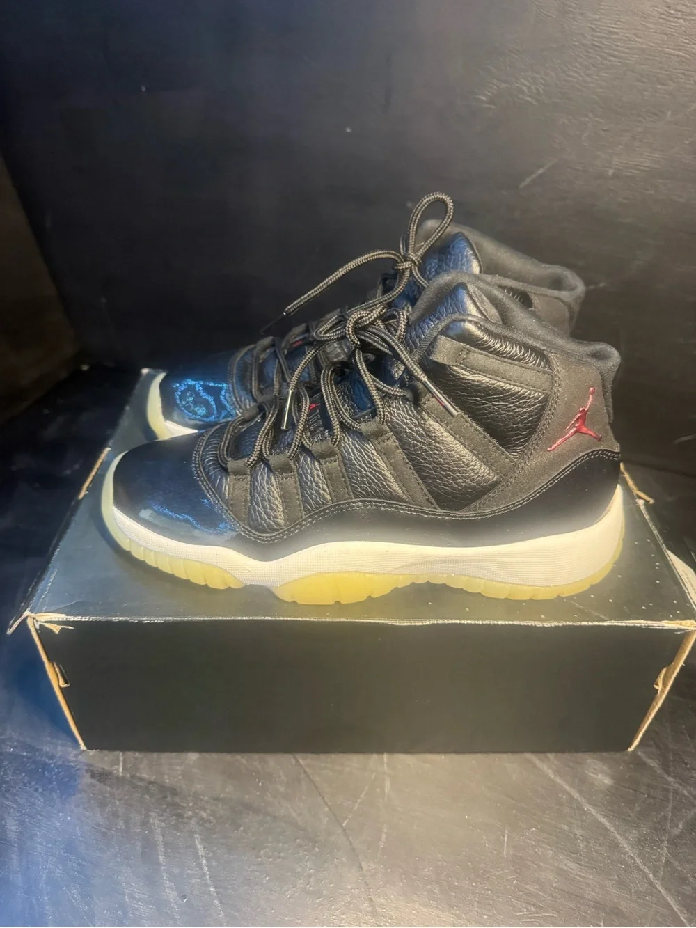 Jordan 11 Retro Mid Black with Gum Sole and Red Jumpman